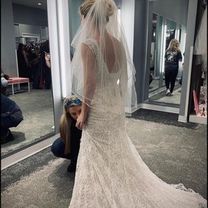 David’s bridal size 8 wedding dress. NWT and has not been altered.